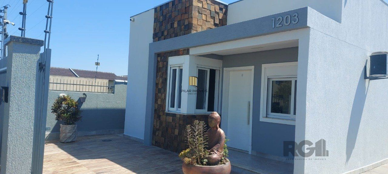 Casa com 2 dormitórios, sendo 1 suíte no bairro Florida em Guaíba - Pilar Imóveis