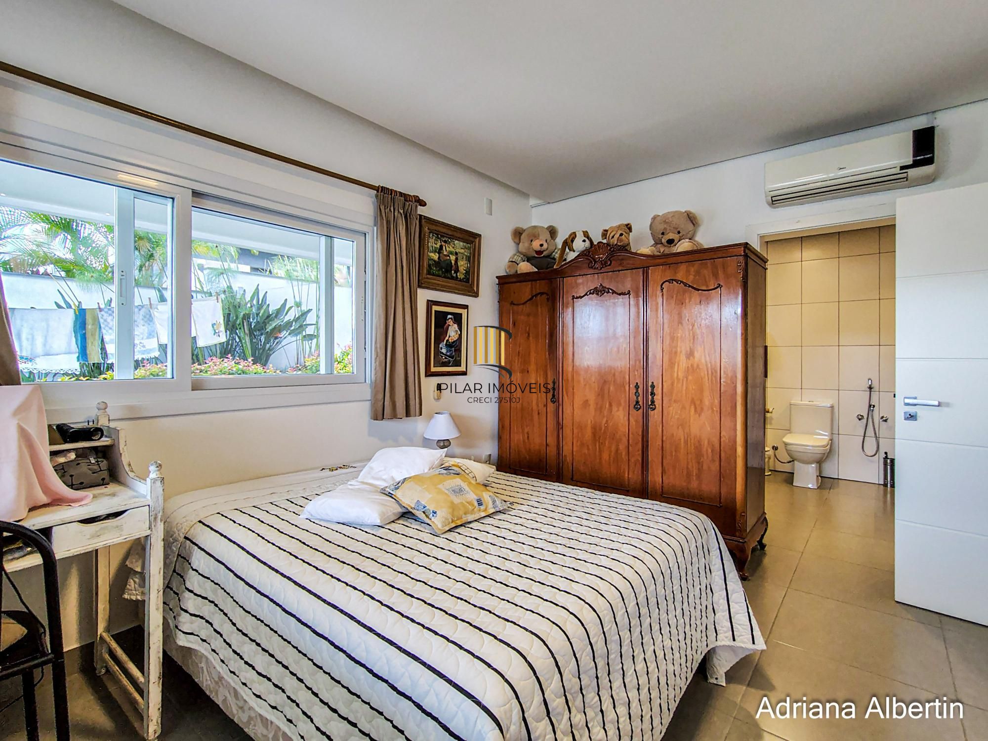 Casa com 660m² no Alphaville Porto Alegre para quem quer espaço, vista e personalidade — sem cair no padrão genérico