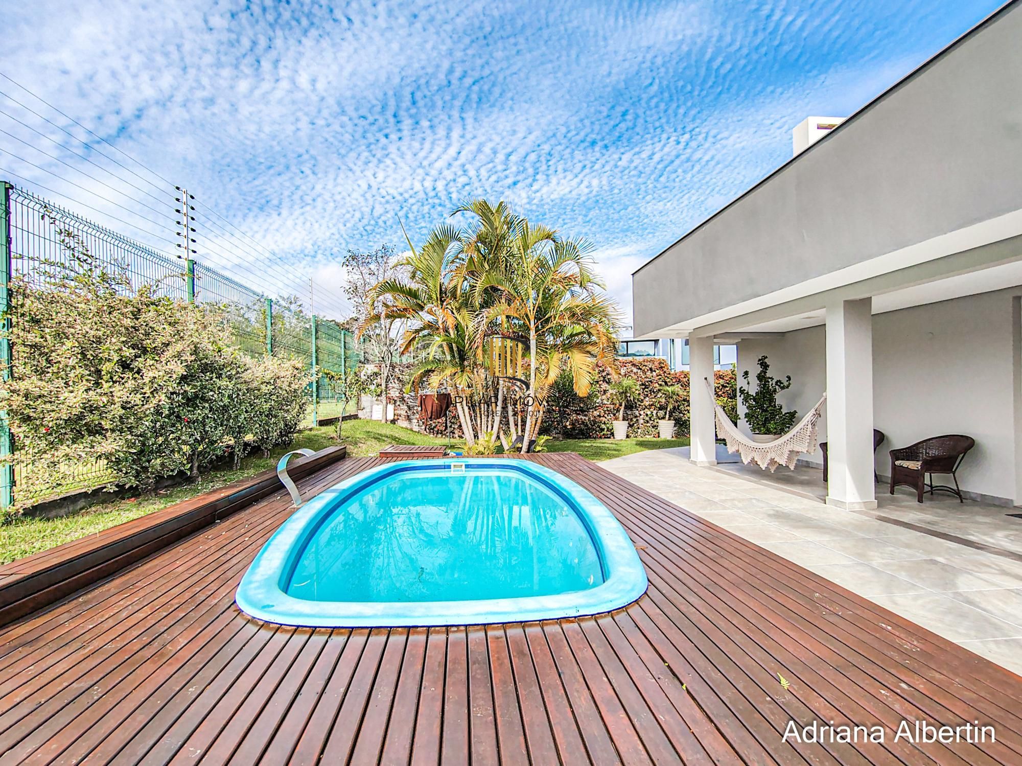 ALPHAVILLE PORTO ALEGRE | CASA COM FUNDOS PARA APP E ÁREA EXTERNA COMPLETA