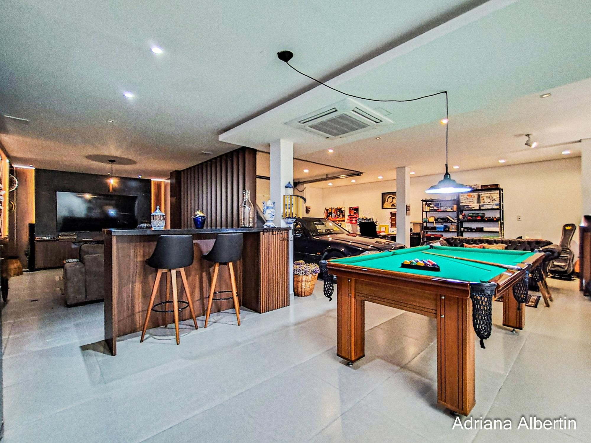 Casa com 660m² no Alphaville Porto Alegre para quem quer espaço, vista e personalidade — sem cair no padrão genérico