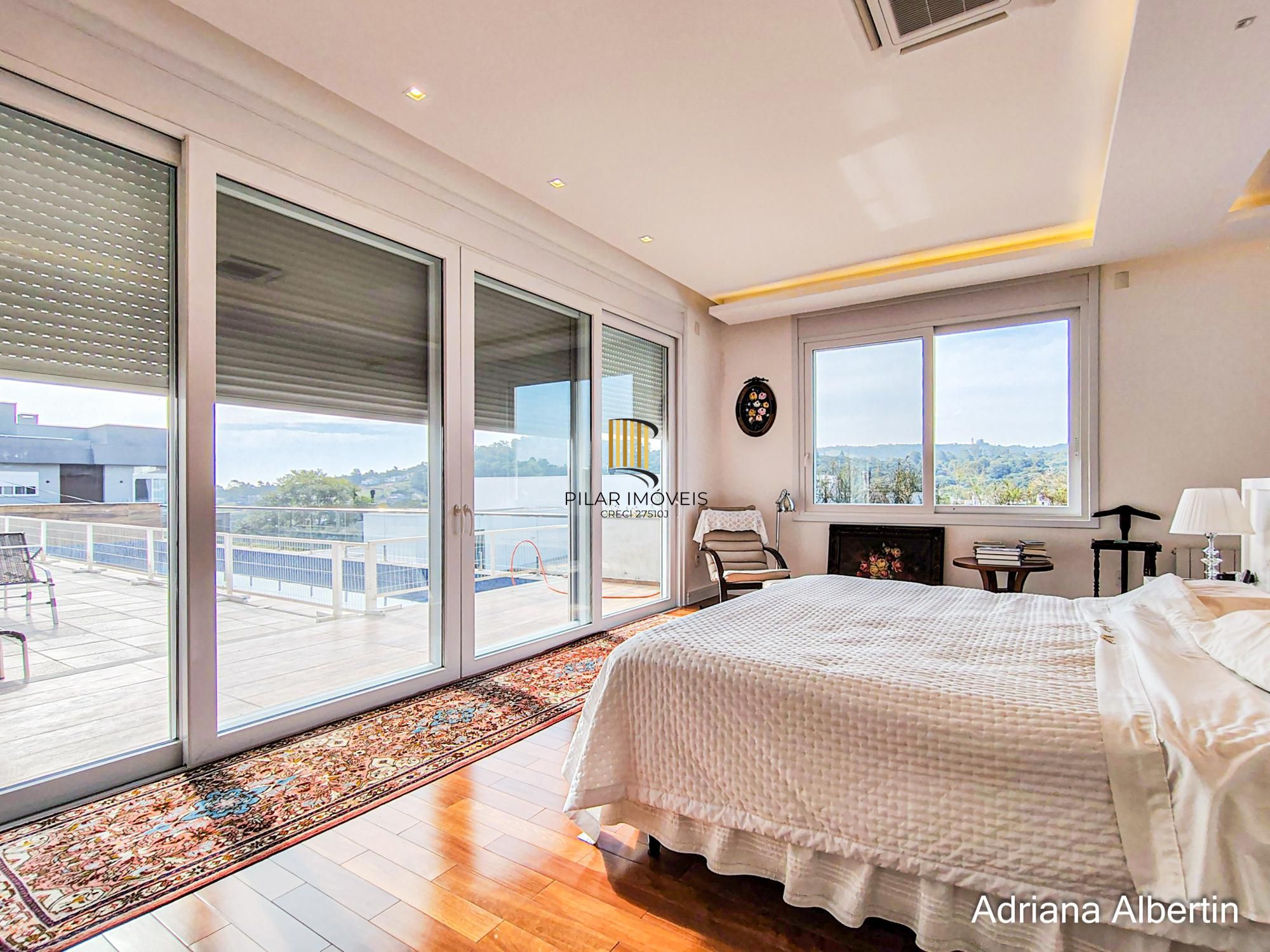 Casa com 660m² no Alphaville Porto Alegre para quem quer espaço, vista e personalidade — sem cair no padrão genérico