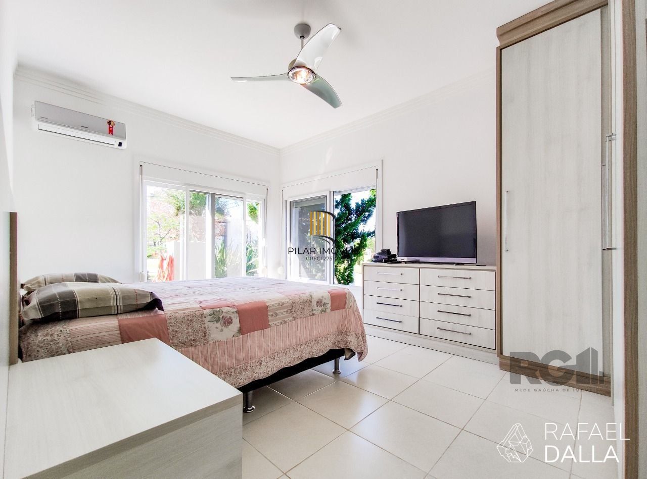 Casa de Condomínio 4 dormitórios no bairro Atlântida Sul