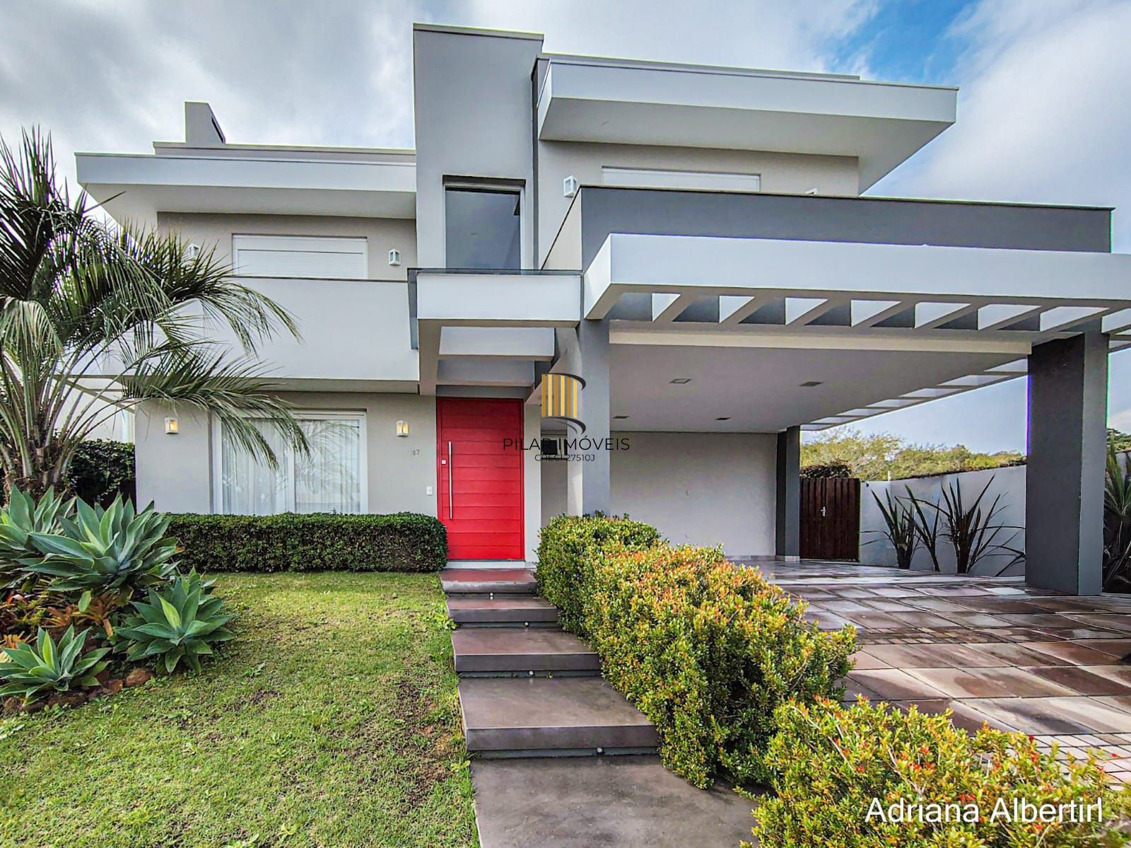 ALPHAVILLE PORTO ALEGRE | CASA COM FUNDOS PARA APP E ÁREA EXTERNA COMPLETA