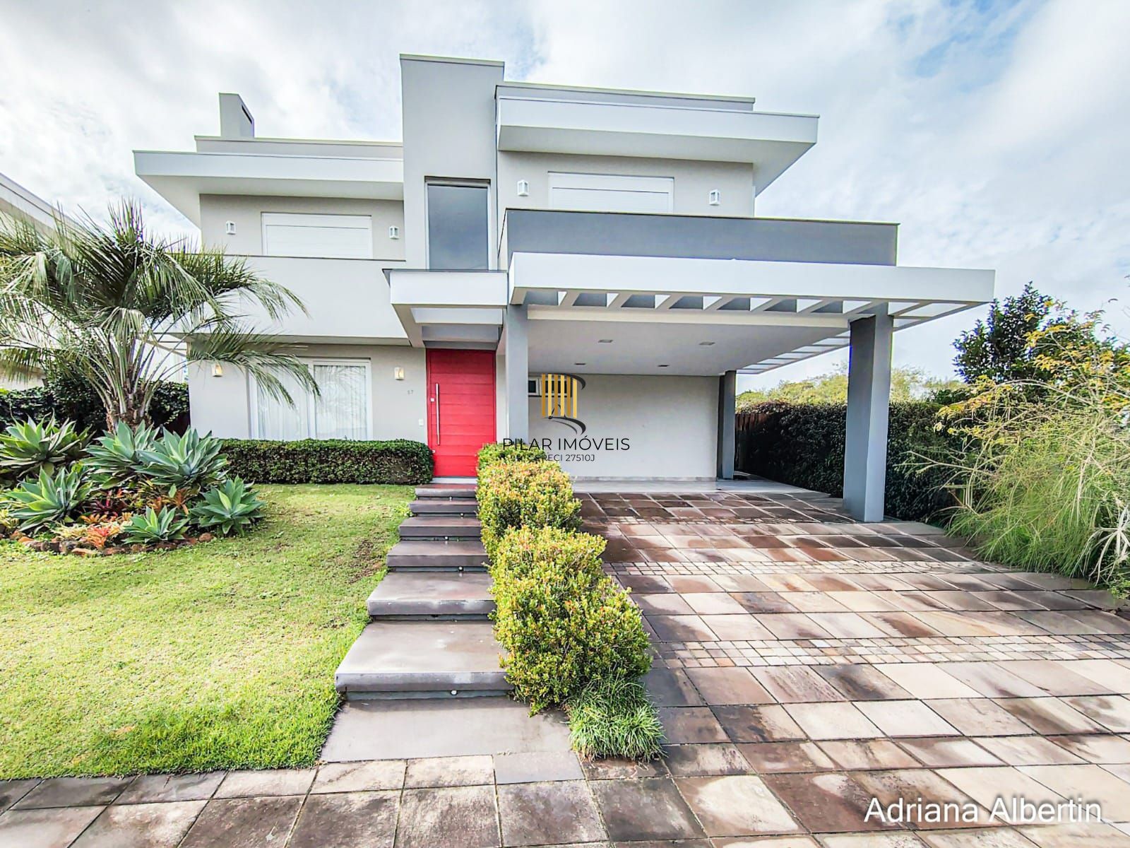 ALPHAVILLE PORTO ALEGRE | CASA COM FUNDOS PARA APP E ÁREA EXTERNA COMPLETA - Pilar Imóveis