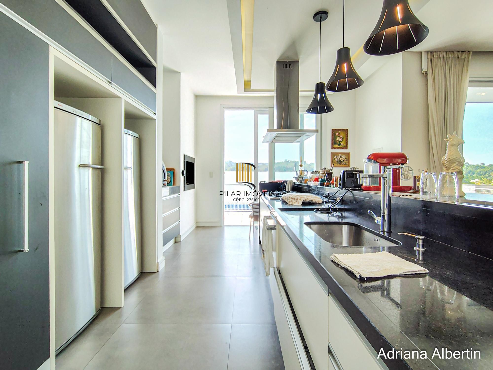 Casa com 660m² no Alphaville Porto Alegre para quem quer espaço, vista e personalidade — sem cair no padrão genérico