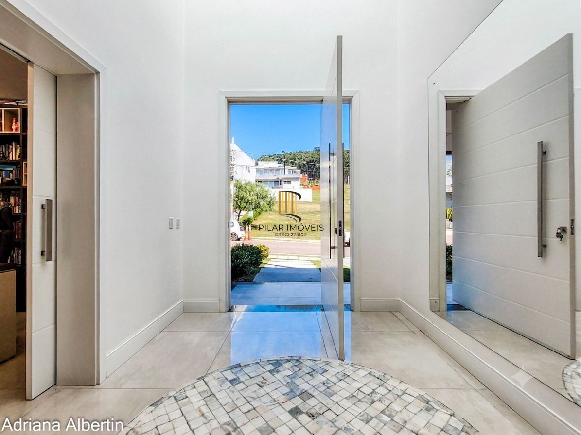 Casa térrea à venda no Alphaville Porto Alegre | 3 suítes | Ambientes integrados