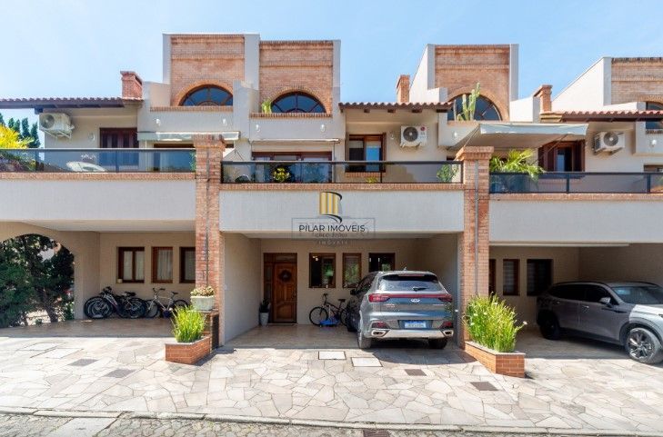 Casa de Condomínio 4 dormitórios no bairro Pedra Redonda