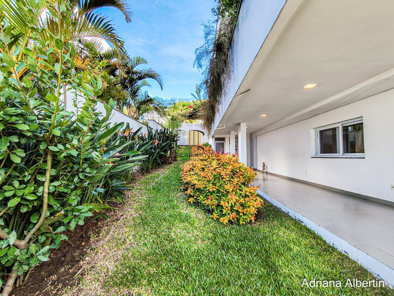 Casa com 660m² no Alphaville Porto Alegre para quem quer espaço, vista e personalidade — sem cair no padrão genérico