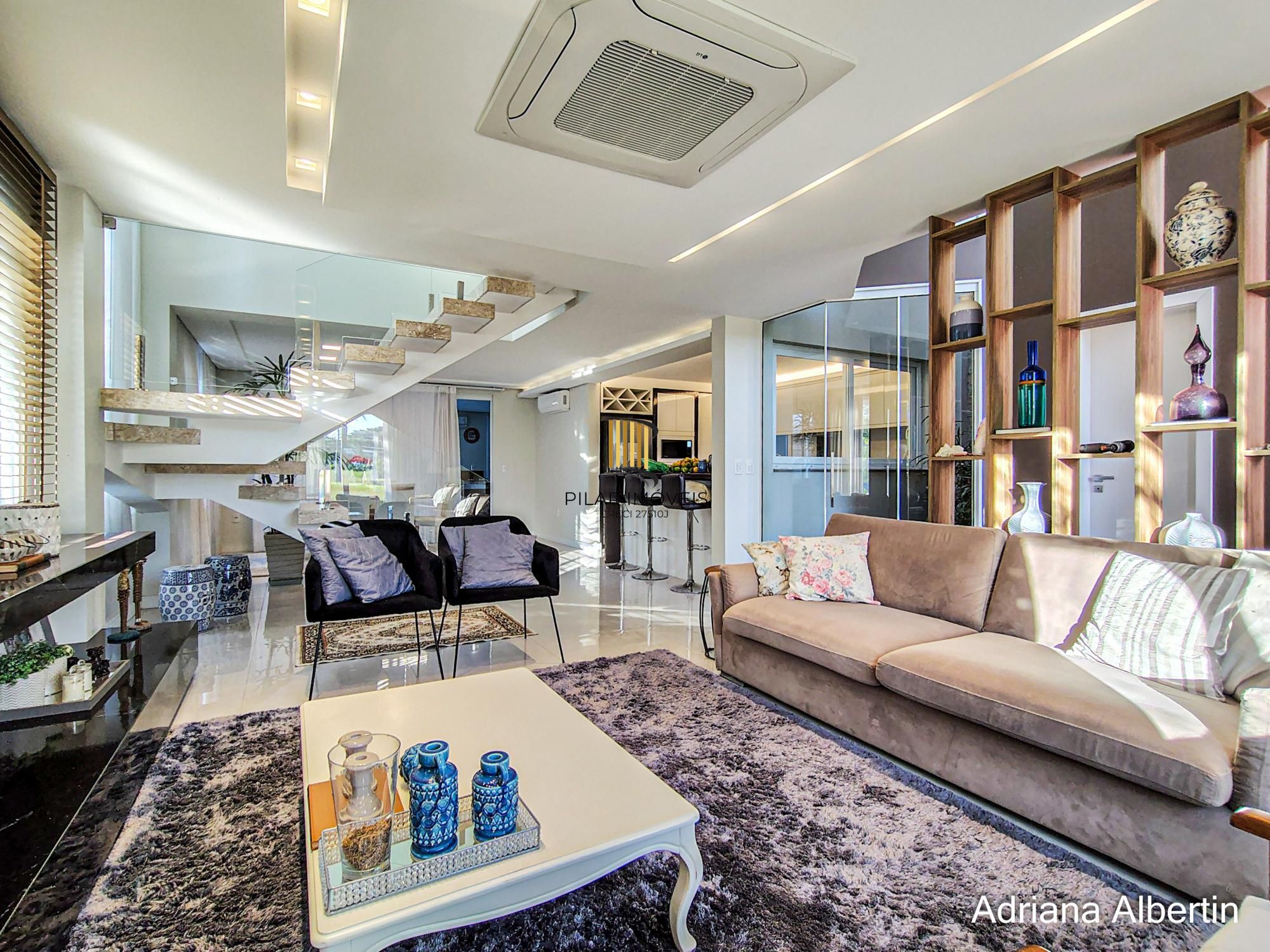 ALPHAVILLE PORTO ALEGRE | CASA COM FUNDOS PARA APP E ÁREA EXTERNA COMPLETA
