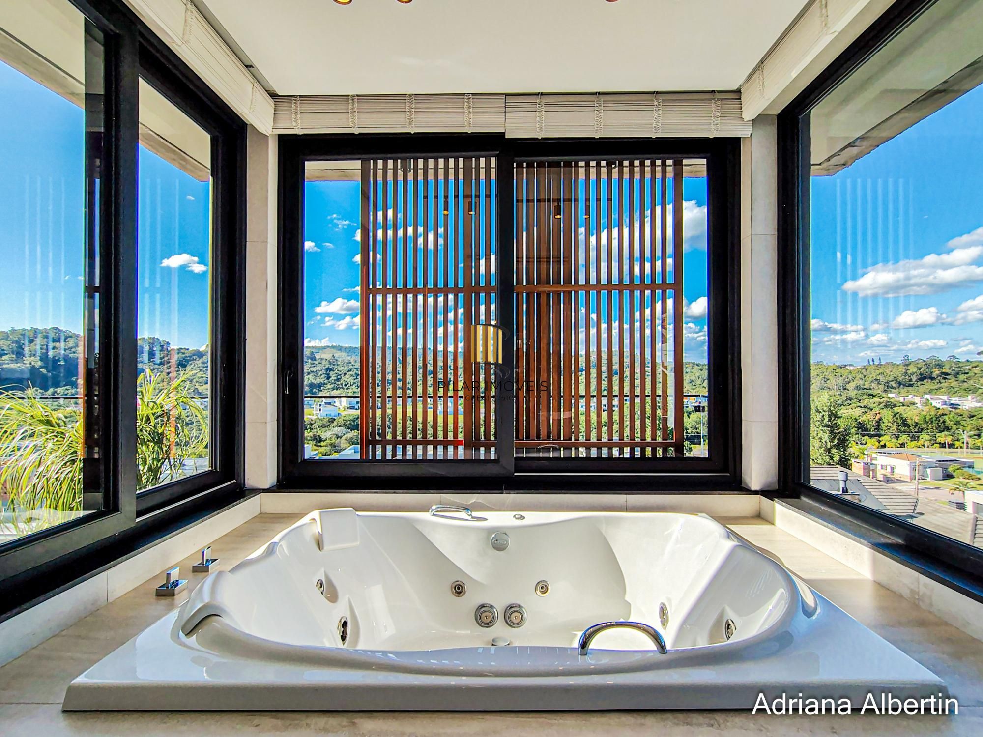 Casa com 4 suítes e escritório - Alphaville Porto Alegre