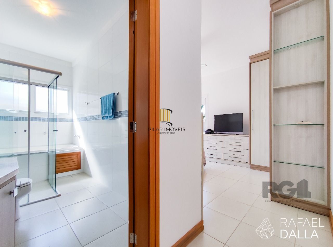 Casa de Condomínio 4 dormitórios no bairro Atlântida Sul