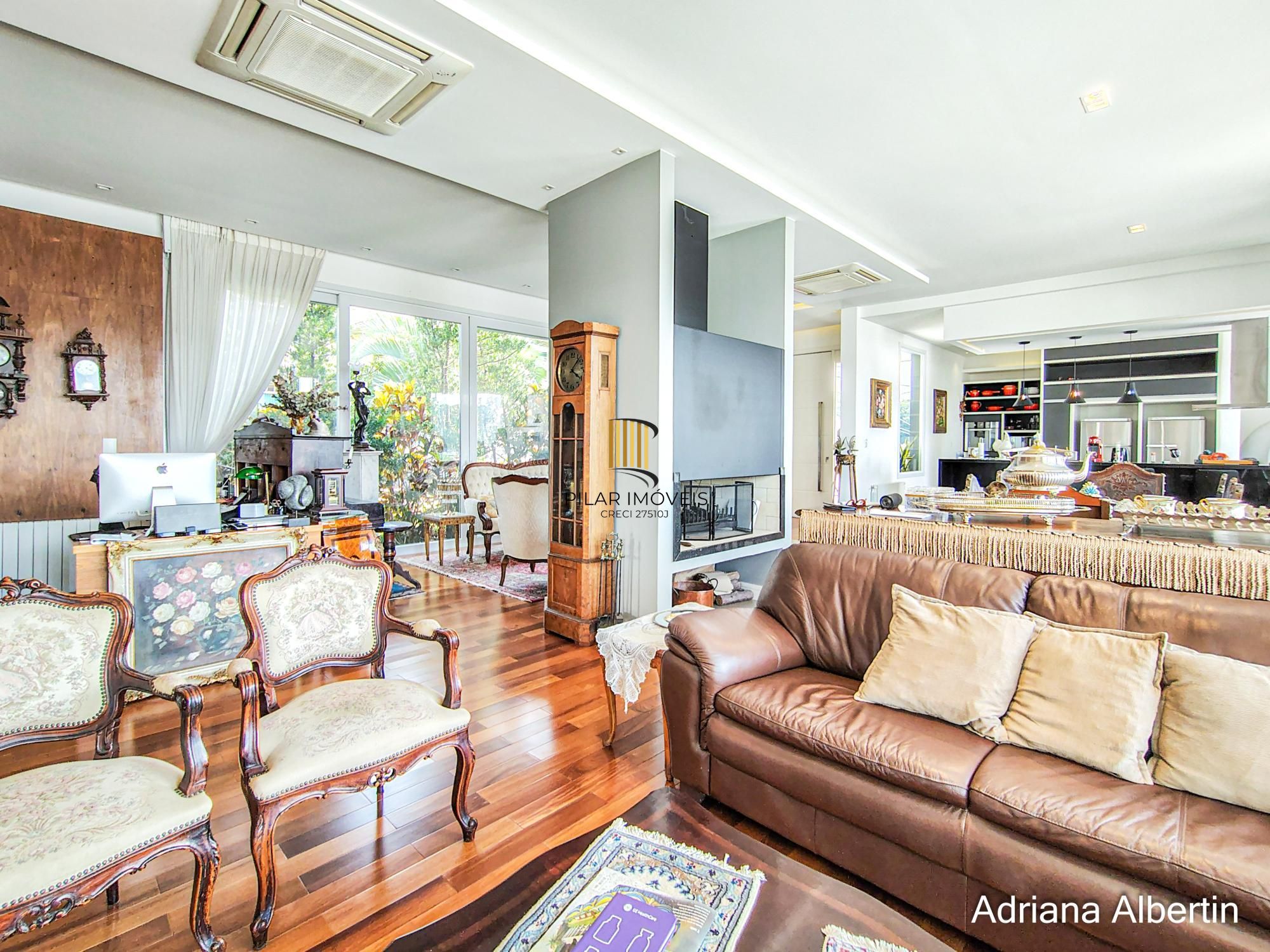 Casa com 660m² no Alphaville Porto Alegre para quem quer espaço, vista e personalidade — sem cair no padrão genérico