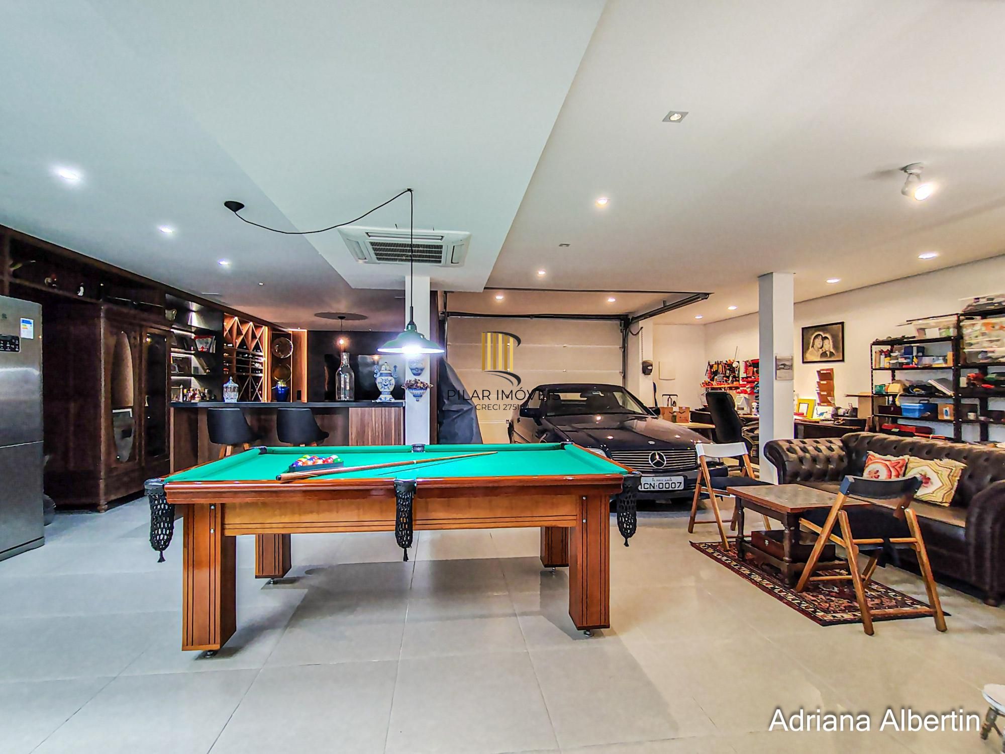 Casa com 660m² no Alphaville Porto Alegre para quem quer espaço, vista e personalidade — sem cair no padrão genérico