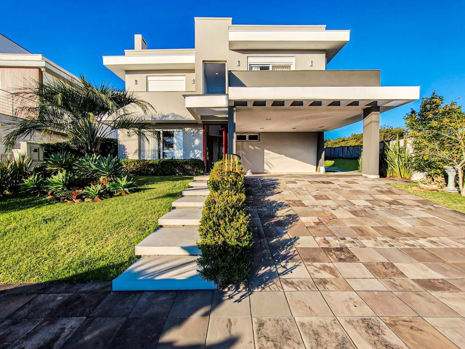 ALPHAVILLE PORTO ALEGRE | CASA COM FUNDOS PARA APP E ÁREA EXTERNA COMPLETA
