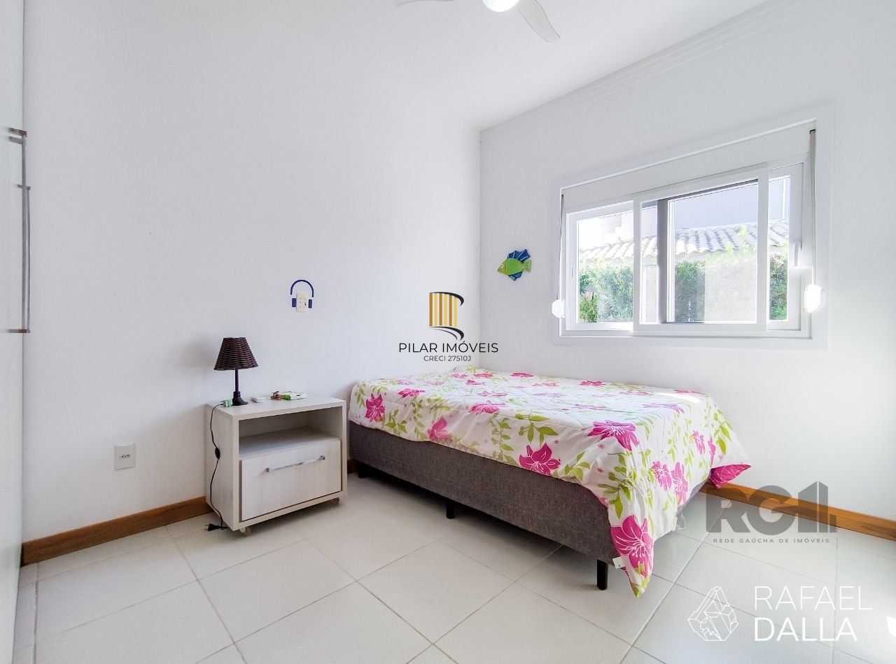 Casa de Condomínio 4 dormitórios no bairro Atlântida Sul
