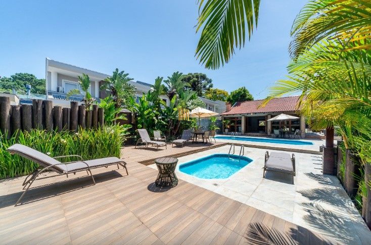 Casa de Condomínio 4 dormitórios no bairro Pedra Redonda