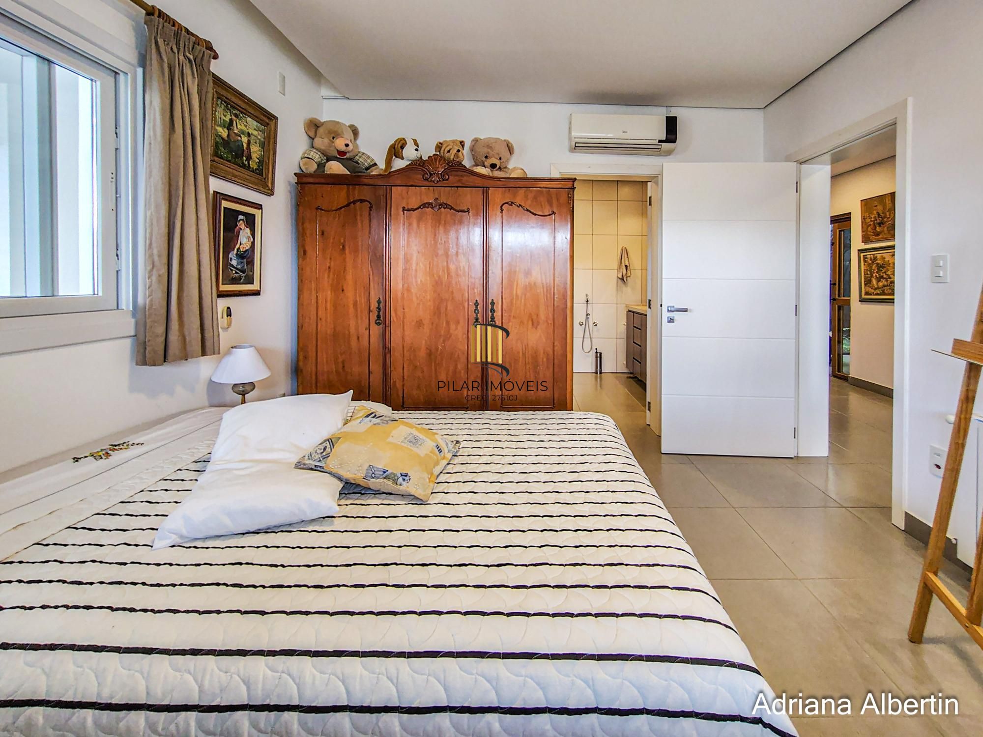 Casa com 660m² no Alphaville Porto Alegre para quem quer espaço, vista e personalidade — sem cair no padrão genérico