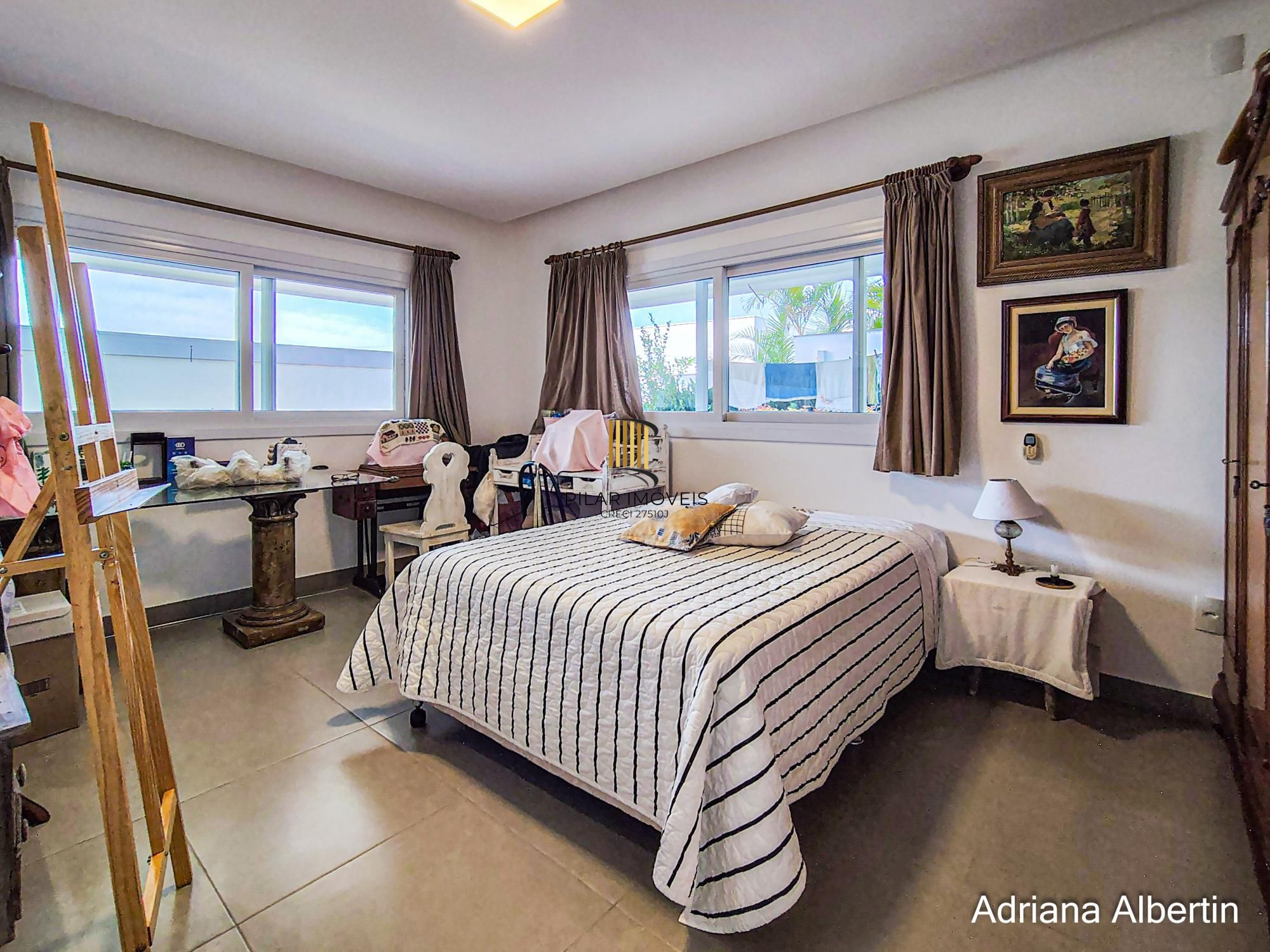 Casa com 660m² no Alphaville Porto Alegre para quem quer espaço, vista e personalidade — sem cair no padrão genérico