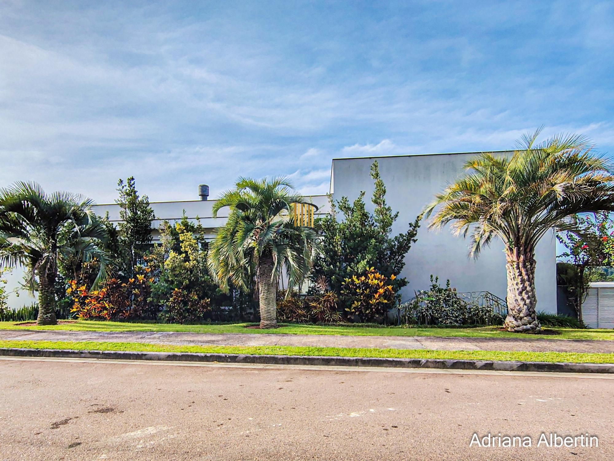 Casa com 660m² no Alphaville Porto Alegre para quem quer espaço, vista e personalidade — sem cair no padrão genérico