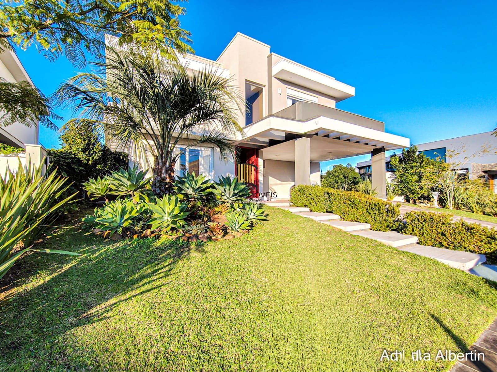 ALPHAVILLE PORTO ALEGRE | CASA COM FUNDOS PARA APP E ÁREA EXTERNA COMPLETA