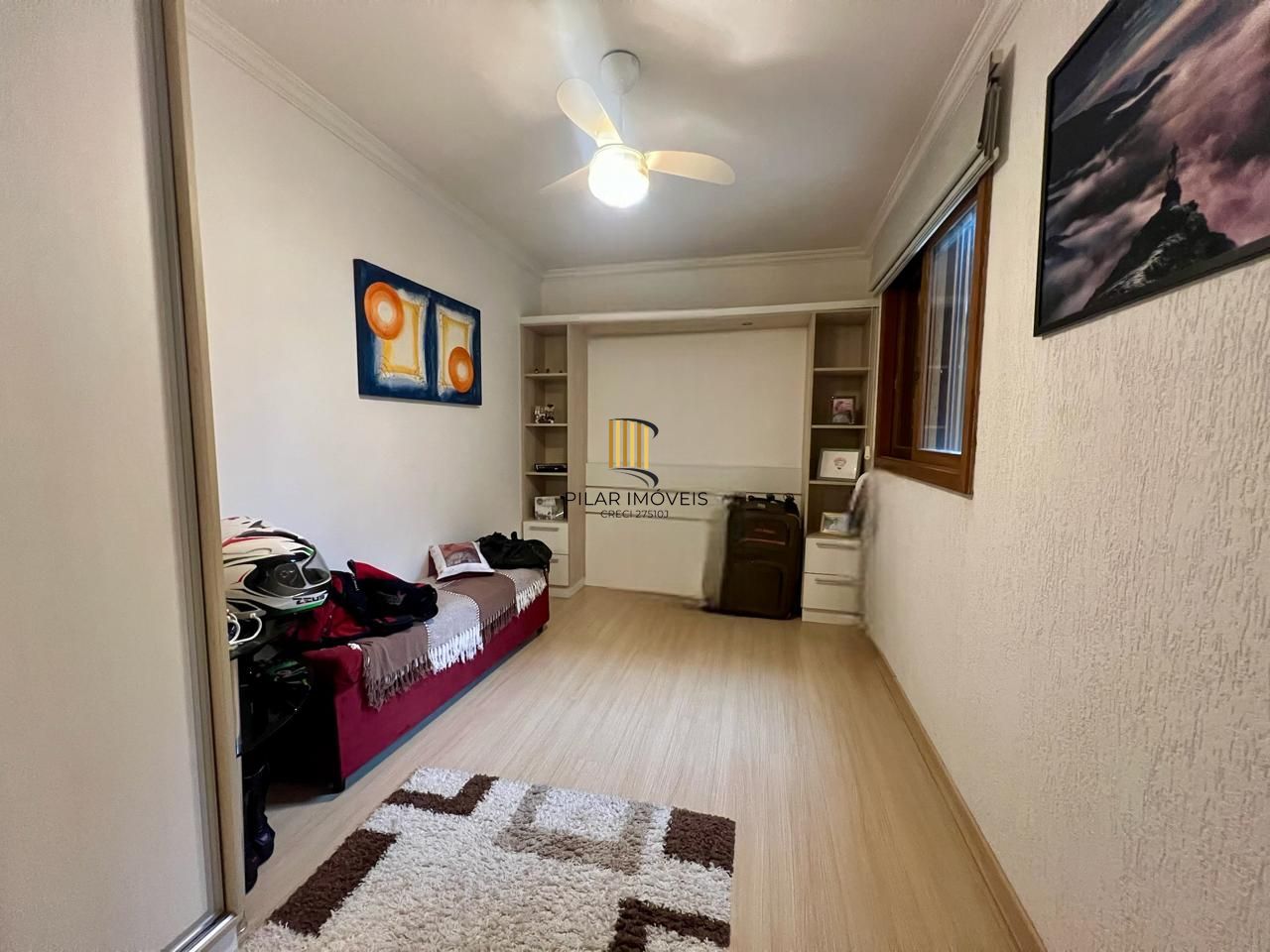 Casa em condomínio 2 dormitórios sem um com closet, vaga coberta, no bairro Cel. Aparicio Borges.
