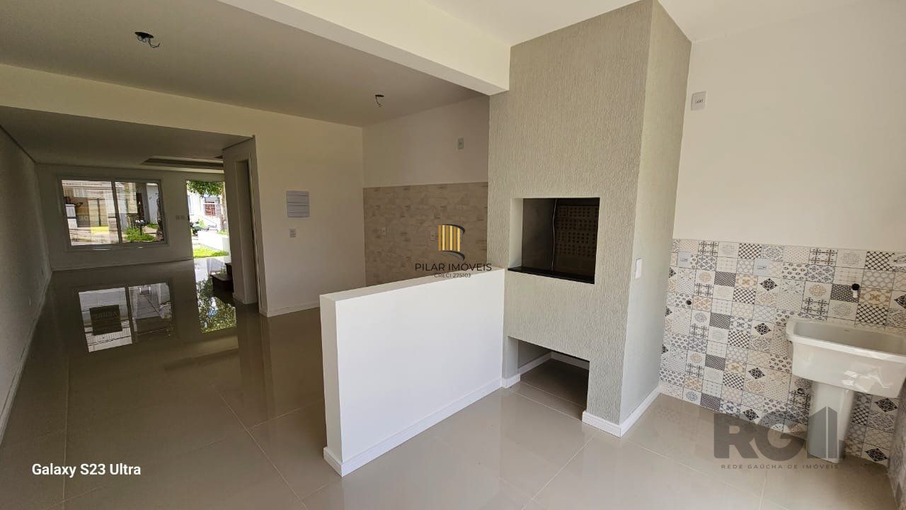 Casa 3 dormitórios no bairro Guarujá
