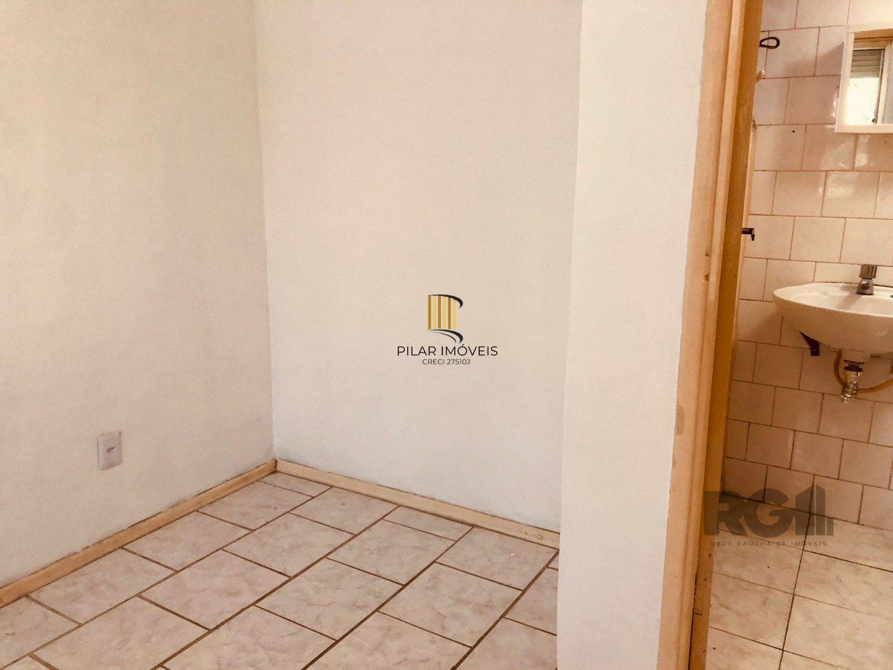 Apartamento de 1 dormitório com vaga no bairro Vila Nova