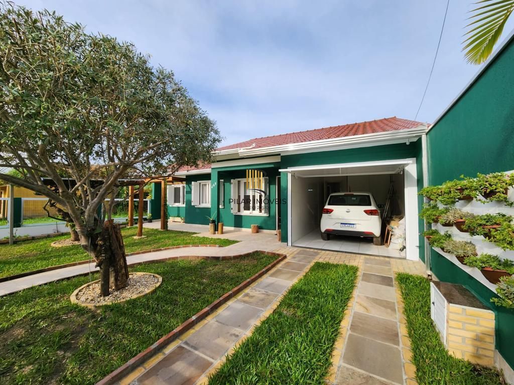 Casa 3 dormitórios, 1 suite, lareira, 2 vagas de garagem, piscina, bairro Mariápolis, Osório-RS