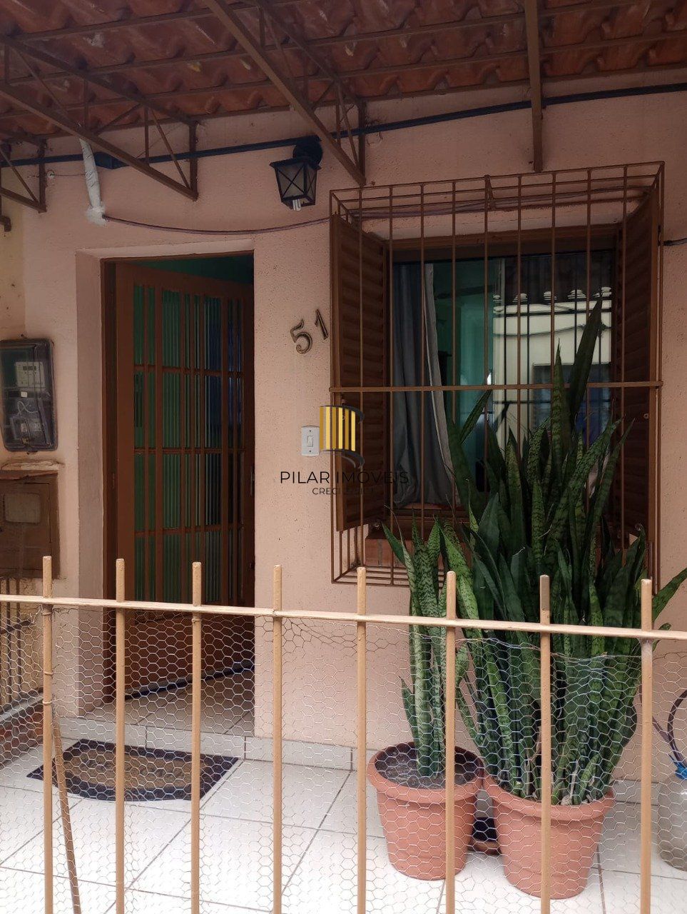 Sobrado para Venda - 36m², 2 dormitórios, 1 vaga - Guarujá, Porto Alegre