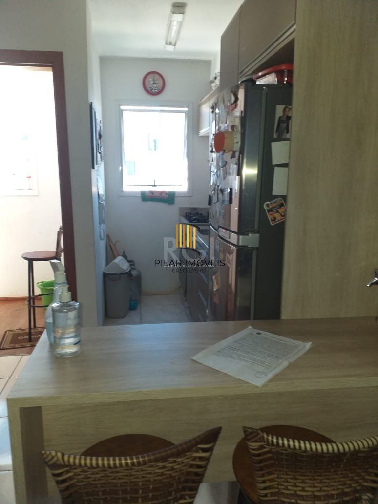 Casa com 2 quartos, banheiro, área de serviço, cozinha, vaga de garagem, no bairro Aberta dos Morros/RS