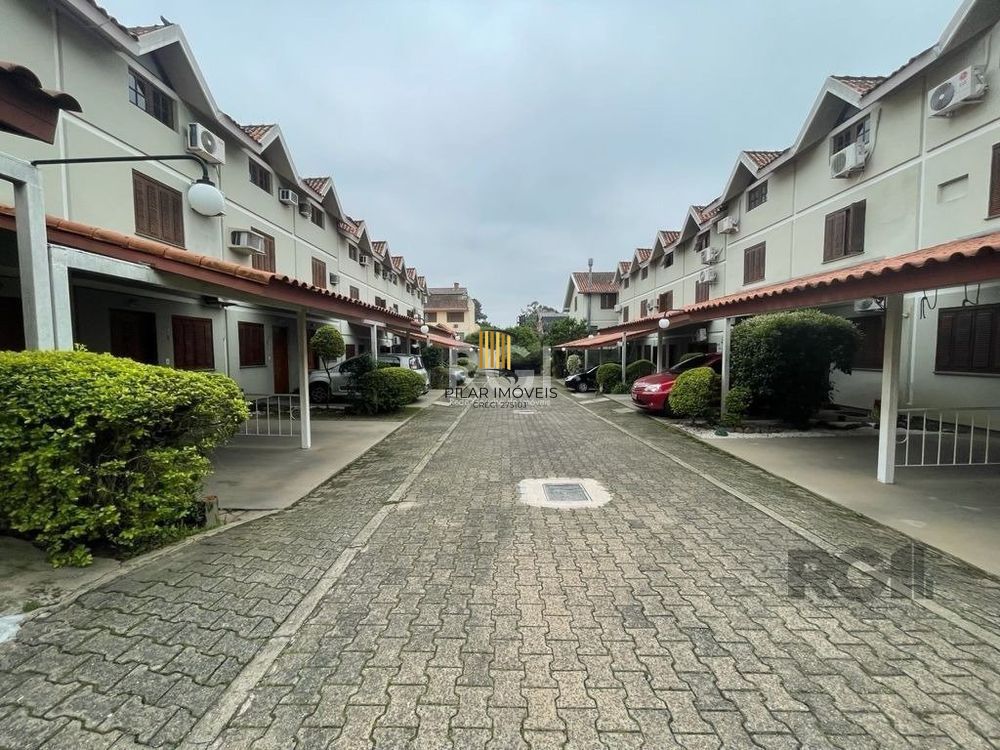 Casa em condomínio fechado  com 94m2, 3 dormitórios no bairro Camaquã.