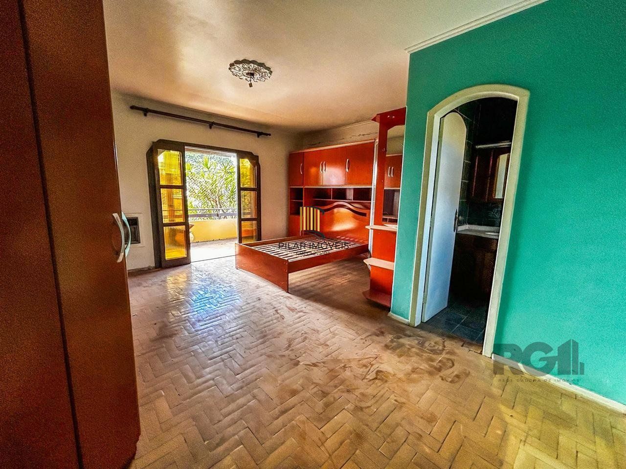 Casa de 3 dormitórios, 1 suíte, garagem fechada, churrasqueira, no bairro Cavalhada Porto Alegre/RS