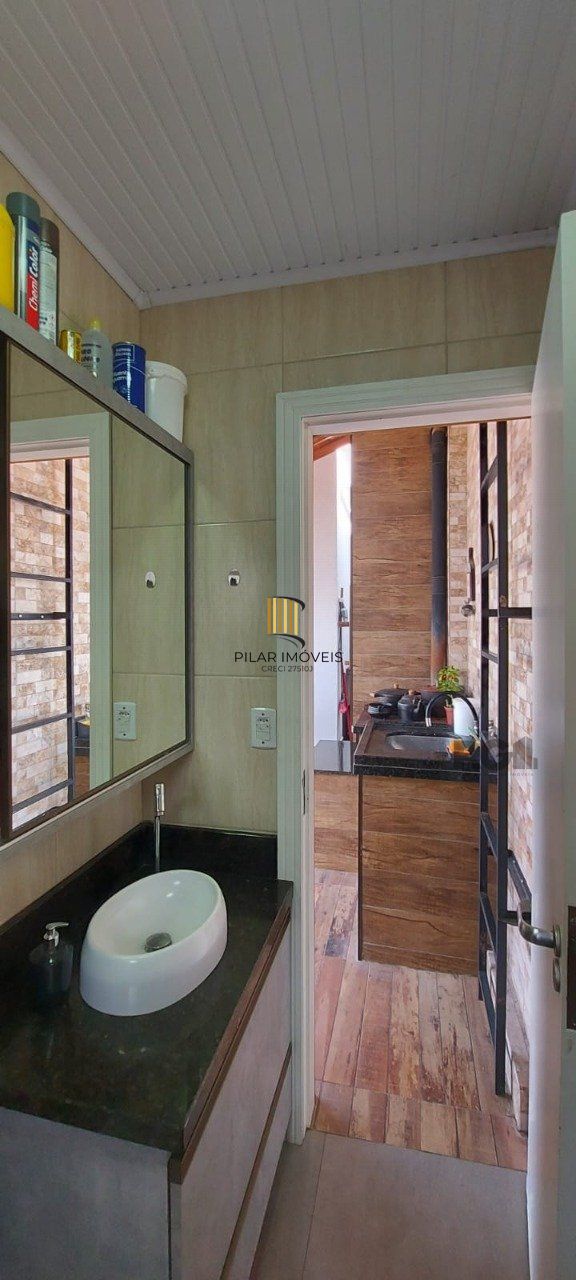 Casa com 2 dormitórios, sendo 1 suíte no bairro Florida em Guaíba