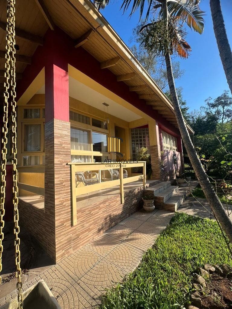 Casa com 4 quartos, suíte, churrasqueira, vaga de garagem, no bairro Elsa, Viamão/RS