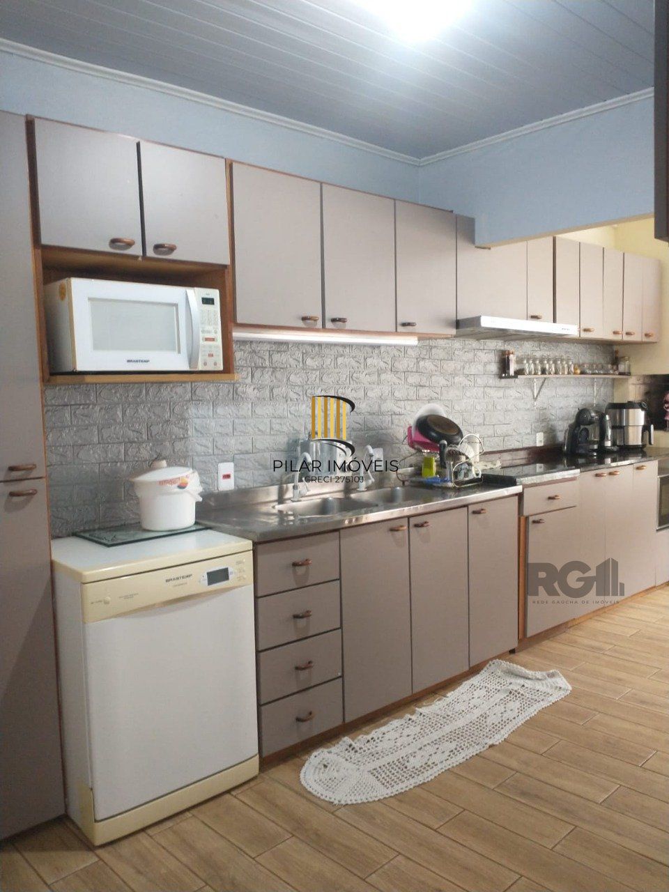 Casa de 155m² com 2 quartos, suíte, 2 vagas de garagem, no bairro Jardim Europa, Porto Alegre/RS