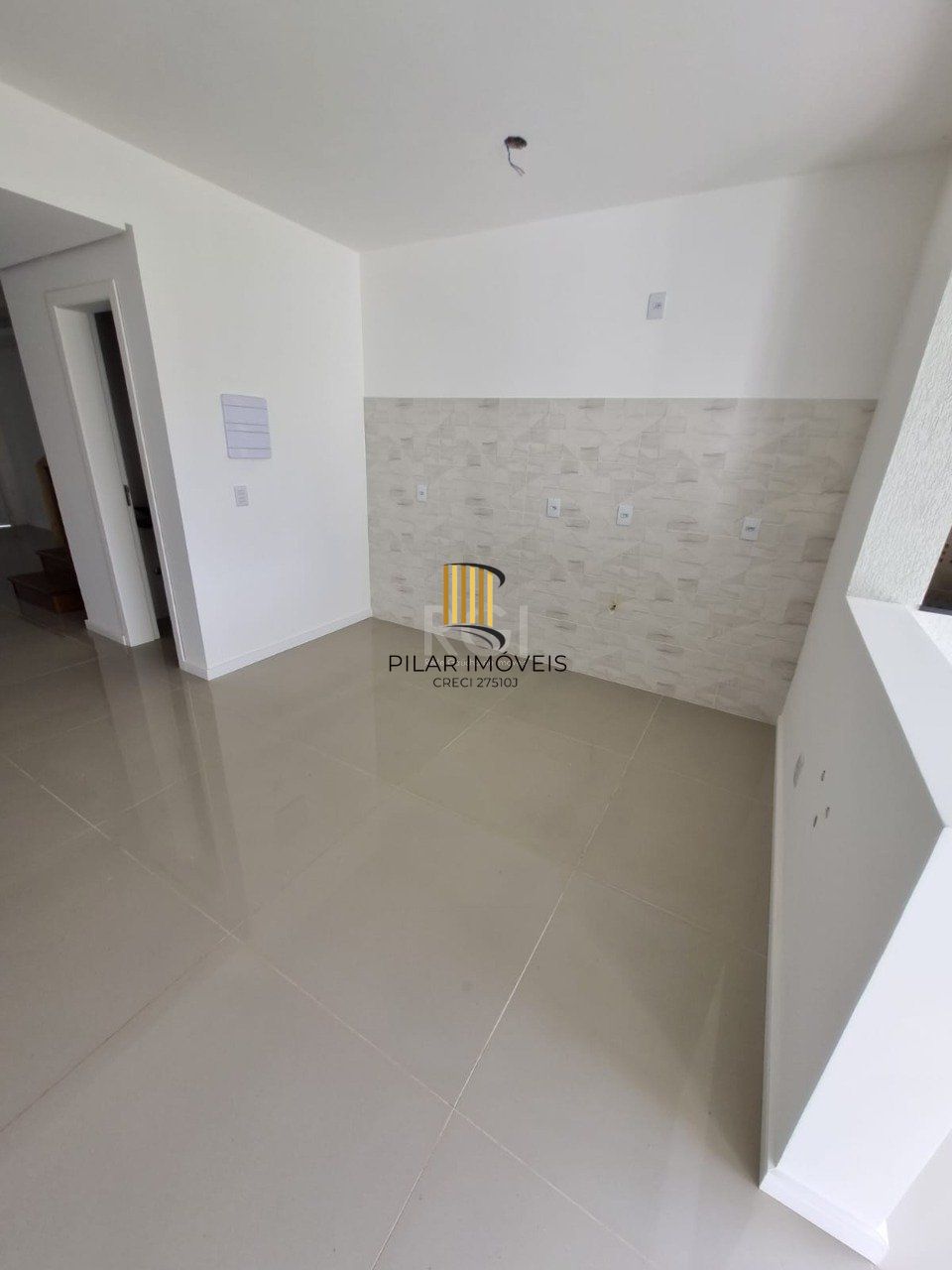 Casa 3 dormitórios no bairro Guarujá