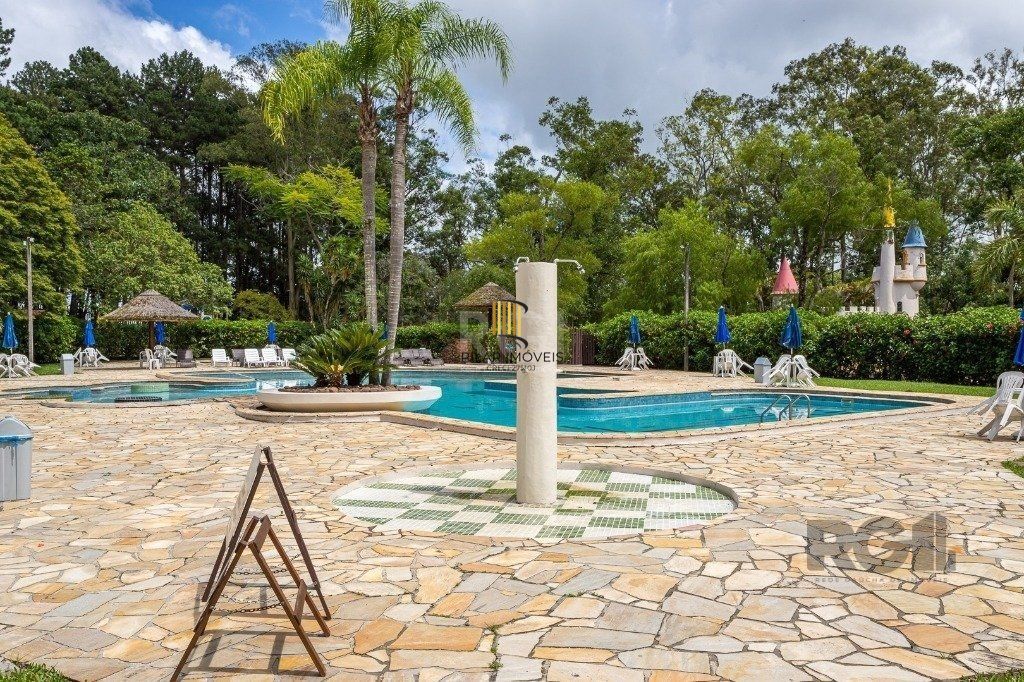 Casa com 4 quartos, suíte, churrasqueira, vaga de garagem, no bairro Elsa, Viamão/RS