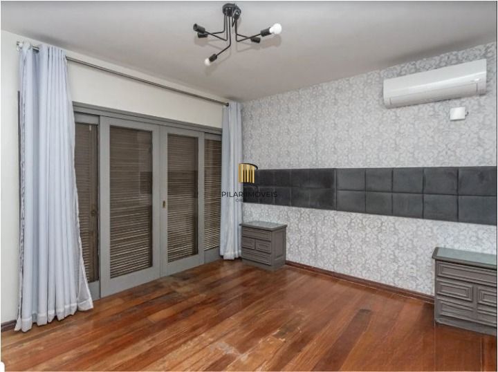 Casa de Condomínio 3 dormitórios no bairro Cavalhada