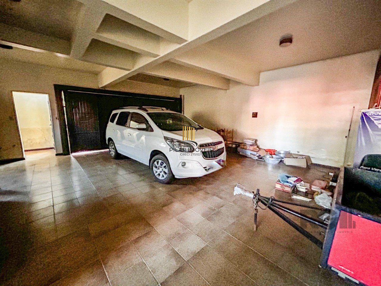 Casa de 3 dormitórios, 1 suíte, garagem fechada, churrasqueira, no bairro Cavalhada Porto Alegre/RS