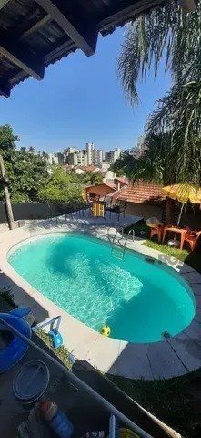 Casa 4 dormitórios no bairro Tristeza
