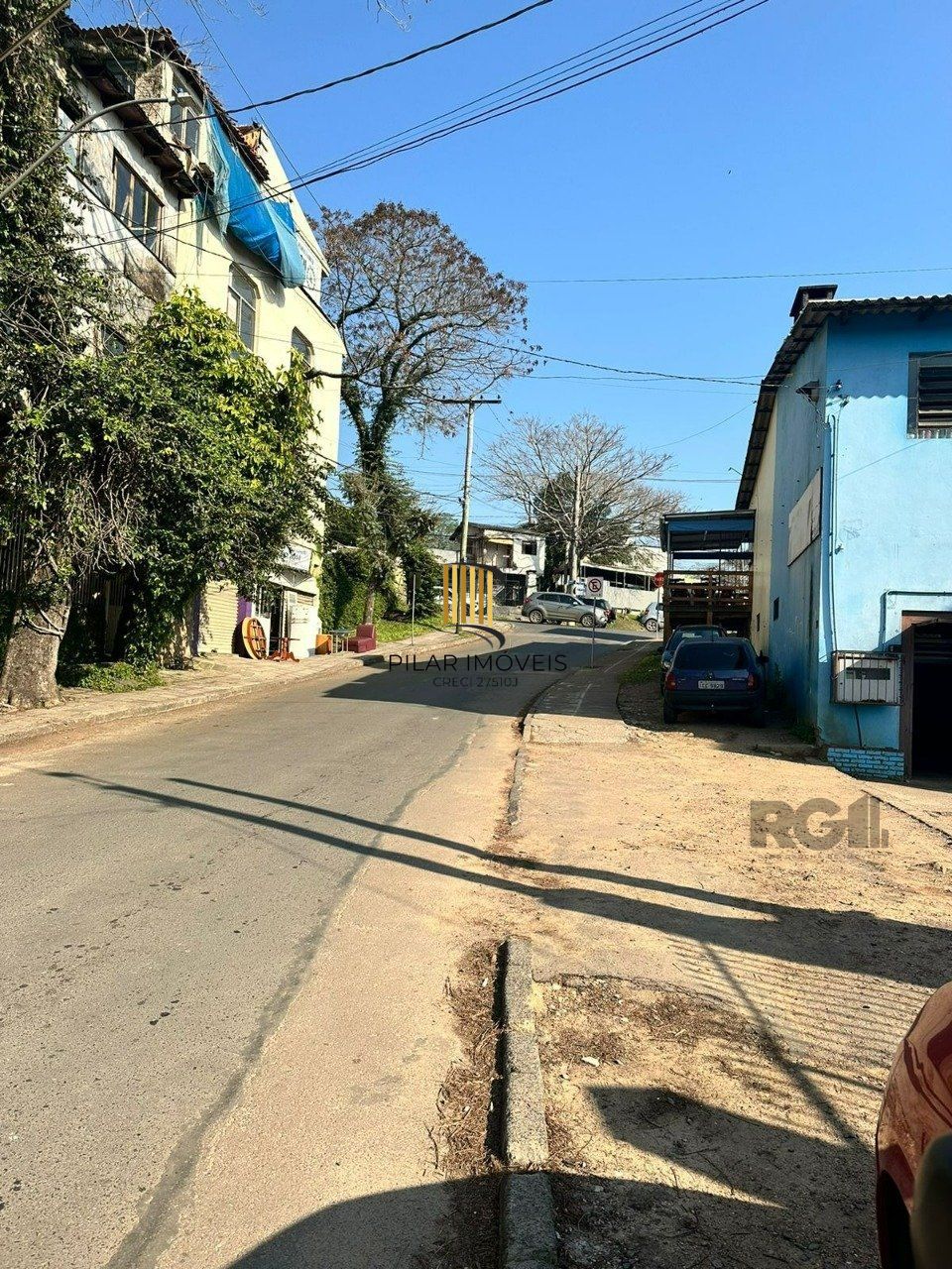 Terreno com 66m² e casa mista, no bairro Vila Nova