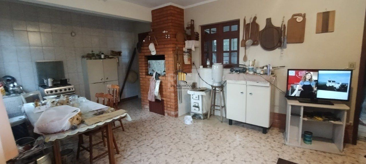 Casa de 4 dormitórios no bairro Parque Santa Fé
