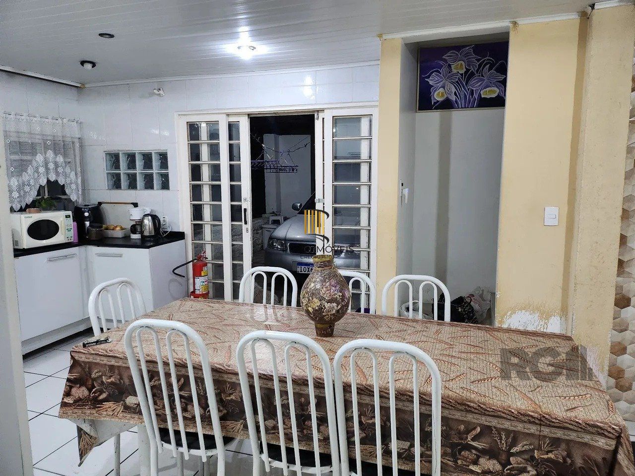  Casa com 4 quartos, 1 suíte, 7 vagas de garagem, churrasqueira -  97,32m² no bairro Jardim Carvalho, Porto Alegre/RS