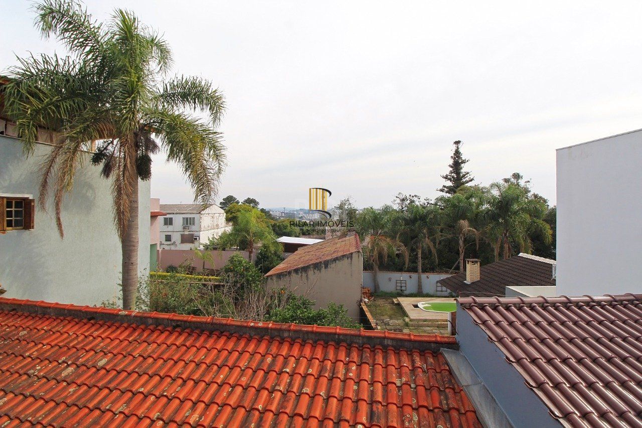 Casa para Venda - 339m², 3 dormitórios, 2 vagas - Vila Nova, Porto Alegre