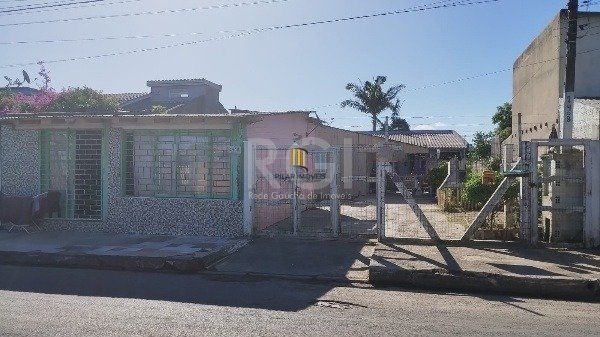 Terreno com 3 casas no pátio bairro  São Francisco TRAMANDAÌ/RS - Pilar Imóveis