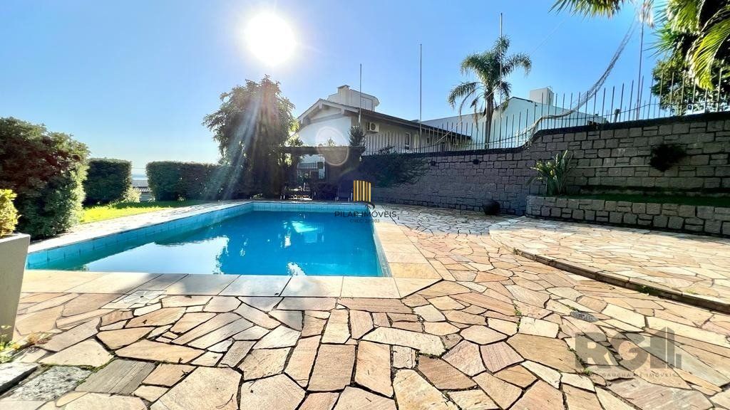 Casa de Condomínio 4 dormitórios no bairro Nonoai