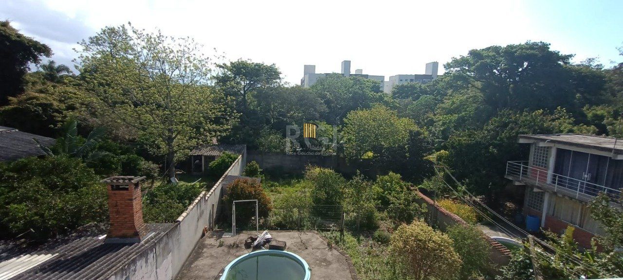 Casa para Venda - 250m², 3 dormitórios, sendo 1 suites, 2 vagas - Vila Nova, Porto Alegre