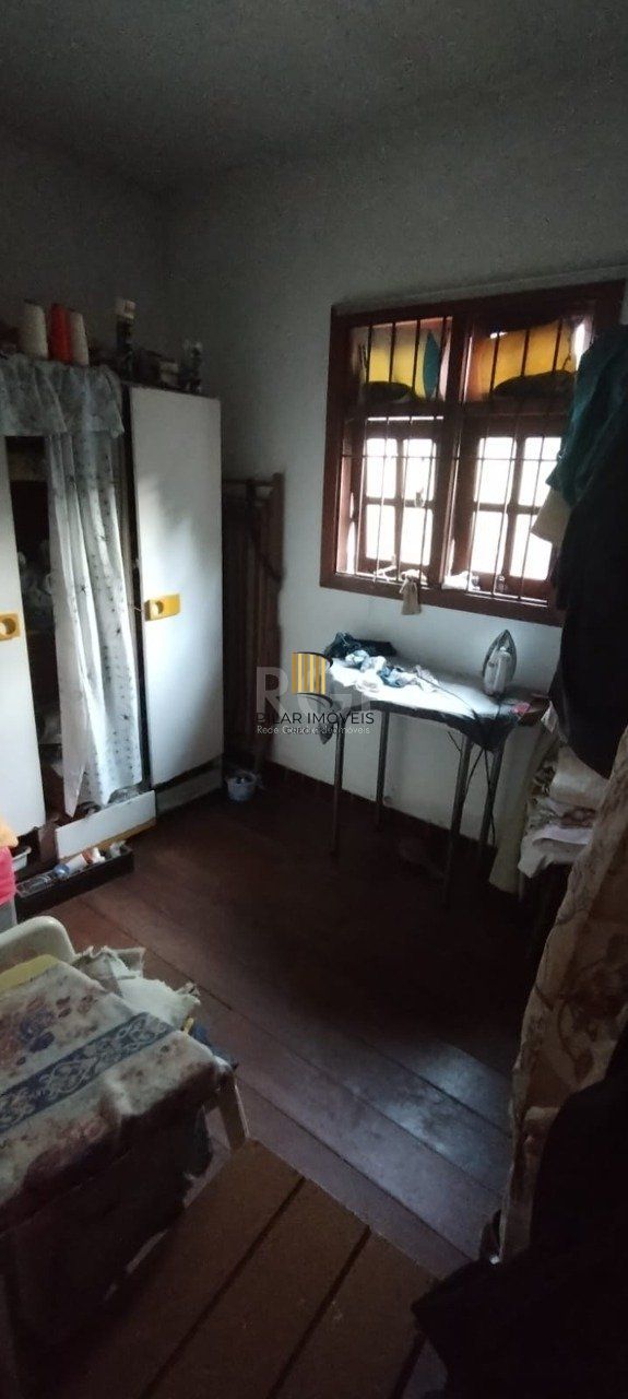 Casa de 4 dormitórios no bairro Parque Santa Fé