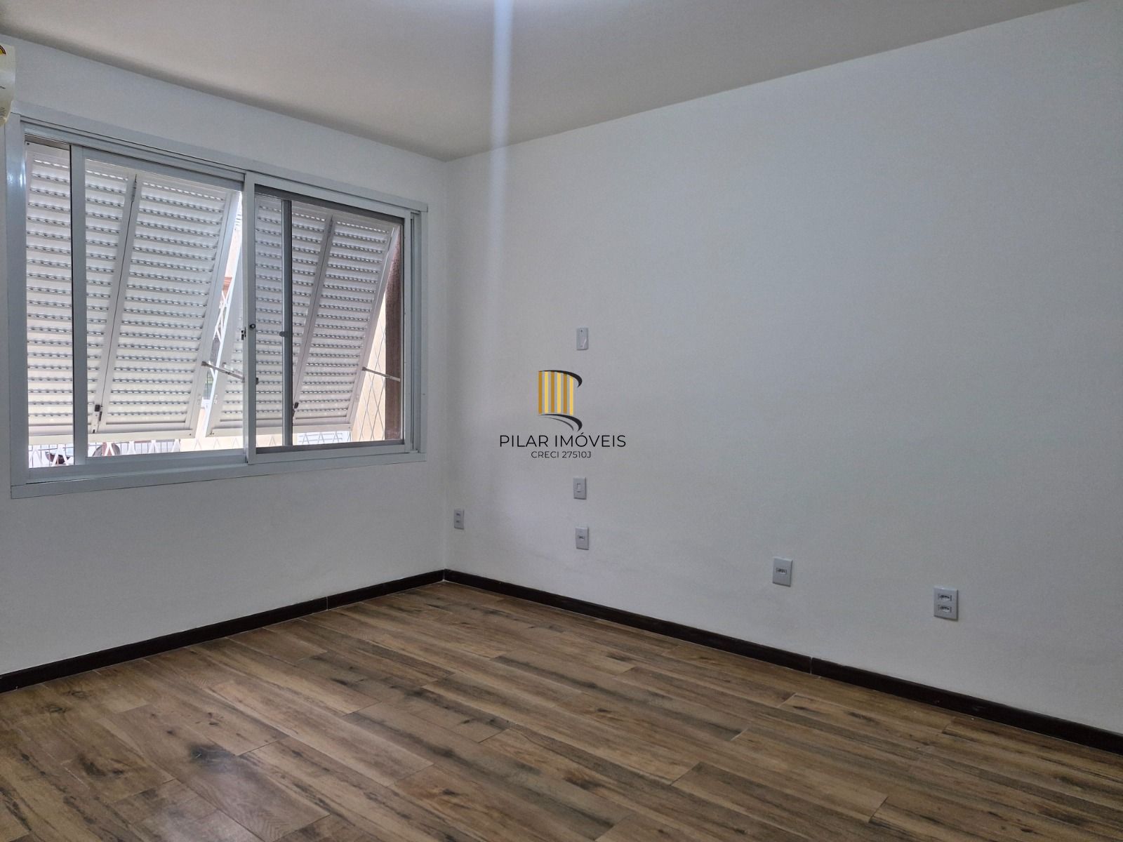 Apartamento de 2 dormitórios com vista para o Marinha no bairro Menino Deus em Porto Alegre/RS