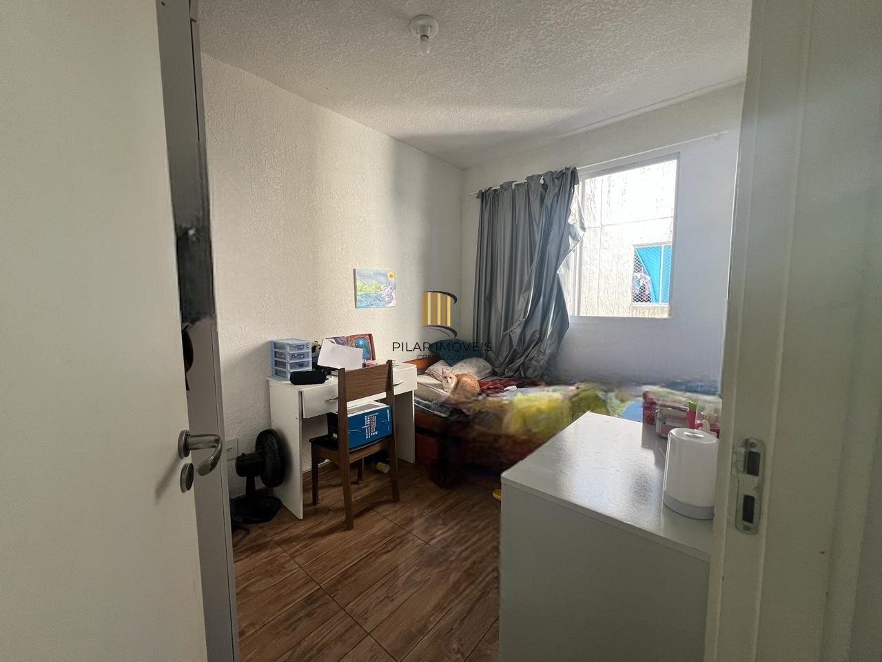 Apartamento 2 dormitórios com vaga no bairro Cavalhada.